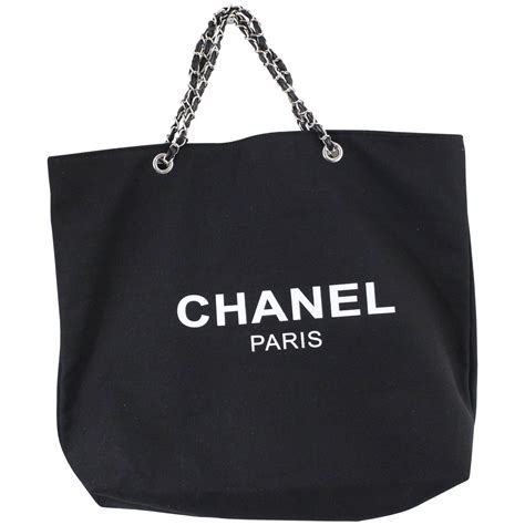 chanel totes black|Chanel black canvas tote.